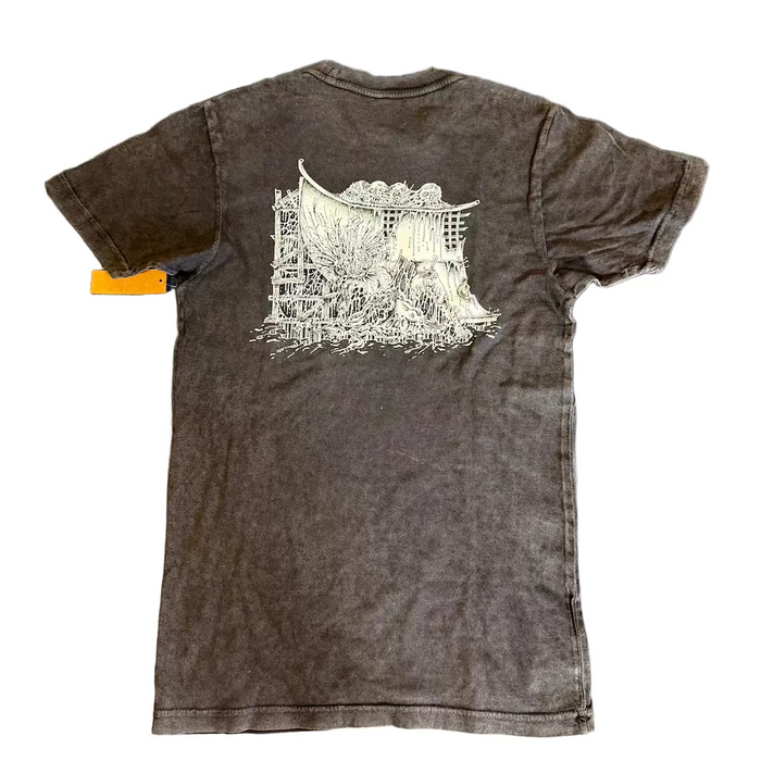 Brown t-shirt with white graphic design on a textured gray surface