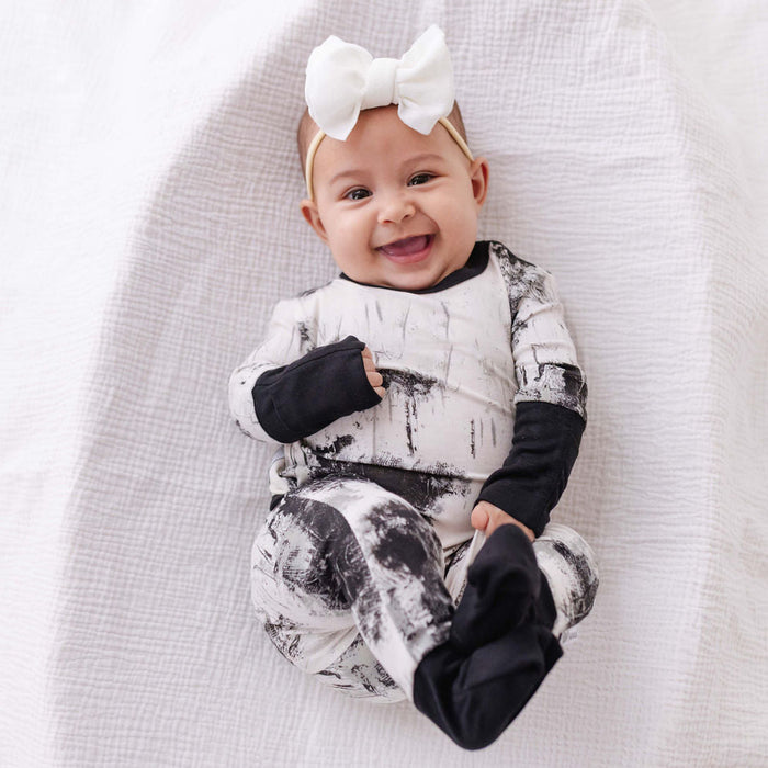 Caden & Crew Black Art for Autism Day to Night Romper